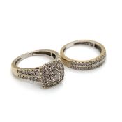 AN 18ct HALLMAKRED GOLD AND DIAMOND BRIDAL SET. THE CLUSTER RING WITH DIAMOND SET SHOULDERS,