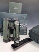 A PAIR OF SWAROVSKI EL BINOCULARS 8.5 X 42 (BOXED)