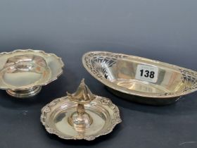 THREE HALLMARKED SILVER BONBON DISHES, THE SMALLEST WITH A CENTRAL YACHT FINIAL, 225Gms.
