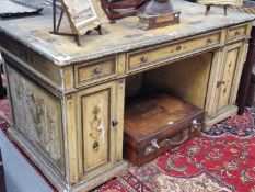 AN EARLY 20th C. CREAM GROUND PEDESTAL DESK, THE TOP PAINTED WITH A CENTRAL HARBOUR SCENE WITHIN