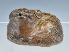 A CHINESE BROWN STONEWARE WATER DROPPER MODELLED AS A RECLINING LION, EX PLESCH COLLECTION. W 9cms.