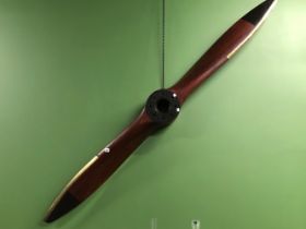 A 1935 ARMSTRONG SIDDELEY CHEETAH WOODEN PROPELLOR. THE BLACKED TIPS BRASS EDGED ON ONE SIDE. W