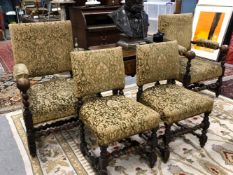 A SET OF EIGHT 17th C. STYLE OAK CHAIRS INCLUDING TWO WITH ARMS, EACH WITH UPHOLSTERED BACKS AND