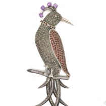 A VINTAGE GEM SET BIRD OF PARADISE ARTICULATING LARGE BROOCH. THE PLUME SET WITH FOUR AMETHYST