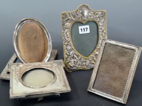 FIVE SILVER MOUNTED PHOTOGRAPH FRAMES AND THREE SMALL SPOONS