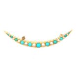 A 20th CENTURY GRADUATED TURQUOISE AND PEARL CRESCENT MOON BROOCH. LENGTH 6.7cms. THE BROOCH