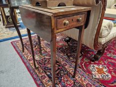 A 19th C. DROP FLAP SIDE TABLE WITH A DRAWER TO ONE NARROW END ABOVE SQUARE SECTION LEGS TAPERING TO