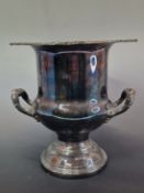 A CANADIAN ELECTROPLATE TWO HANDLED URN ICE BUCKET WITH GADROONED AND ANTHEMION CAST RIM. H 26.