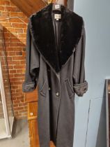 A HARRODS LADIES FULL LENGTH OVERCOAT WITH FAUX FUR CUFFS AND COLLAR.