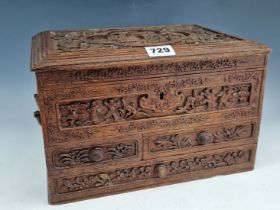 A CHINESE CARVED HARDWOOD JEWELLERY BOX, THE HINGED LID OVER A COMPARTMENT WITH A LIFT OUT TRAY, THE