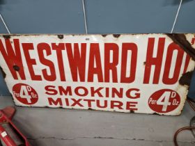 A WHITE GROUND ENAMEL SIGN INSCRIBED IN RED FOR WESTWARD HO SMOKING MIXTURE. 127 x 58cms.