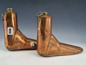 A PAIR OF ARMY AND NAVY COPPER BOOT WARMERS WITH BRASS SCREW TOP CAPS