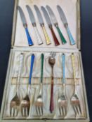 A CASED SET OF SIX DANISH ENAMELLED 925 SILVER GILT COFFEE SPOONS TOGETHER ANOTHER CASE CONTAINING