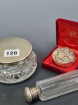 THREE HALLMARKED SILVER TOPPED GLASS DRESSING TABLE WARES TOGETHER WITH A CASED HALLMARKED SILVER