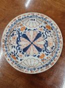 AN 19th C. JAPANESE IMARI DISH PAINTED WITH FLOWERS AND CHRYSANTHEMUM SHAPES. Dia. 28cms.