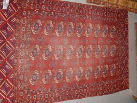 AN ANTIQUE TEKKE BOKHARA RUG. 170 x 120cms