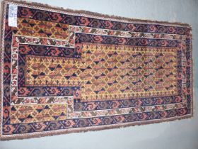 AN ANTIQUE BELOUCH PRAYER RUG. 155 x 83cms