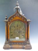 WILLIAM JOHNSON, LONDON, A 19th C. OAK GOTHIC CASED MANTEL CLOCK STRIKING ON A COILED ROD, THE