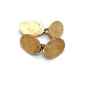 A PAIR OF OVAL OXFORD CUFFLINKS. UNHALLMARKED, ASSESSED AS 12ct GOLD. GROSS WEIGHT 9.77grms.
