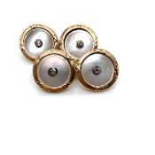 A PAIR OF VINTAGE DIAMOND AND MOTHER OF PEARL SHIRT BUTTONS TO BE WORN AS CUFF LINKS, FITTED WITH
