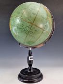 A 1966 PHILIPS CHALLENGE 10 INCH TERRESTRIAL GLOBE ON AN EBONISED STAND WITH A DISHED CIRCULAR FOOT