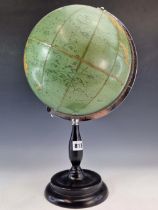 A 1966 PHILIPS CHALLENGE 10 INCH TERRESTRIAL GLOBE ON AN EBONISED STAND WITH A DISHED CIRCULAR FOOT