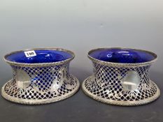 A PAIR OF SILVER POTATO OR DISH RINGS, LONDON 1906, THE LATTICE PIERCED SIDES WITH ROCOCO FOLIAGE
