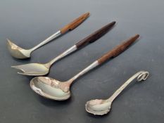 A GEORG JENSEN STERLING SILVER SAUCE LADLE TOGETHER WITH THREE WOODEN HANDLED STERLING SILVER