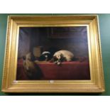 LATE 19th/ EARLY 20th C. TWO KING CHARLES SPANIELS BY A CAVALIER HAT ON A RED CLOTHED TABLE, OIL