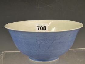 A CHINESE BOWL WITH ANHUA DRAGONS INCISED ON THE EXTERIOR UNDER A LAVENDER BLUE GLAZE, SIX CHARACTER