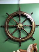 A LATE 19th C. BRASS MOUNTED MAHOGANY SHIPS WHEEL WITH HANDLES EXTENDING TO EACH END OF THE FOUR
