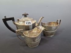 A SILVER THREE PIECE TEA SET BY NATHAN AND HAYES, CHESTER 1911, 376Gms.