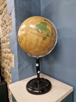 A 1960S PHILIPS CHALLENGE 13 1/2 INCH TERRESTRIAL GLOBE ON AND EBONISED STAND WITH A DISHED CIRCULAR