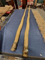 A PAIR OF ANTIQUE NARWHAL TUSKS WITH BRASS MOUNTED ENDS. H 192cms. ( CITES A10. LICENCE No.