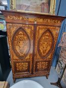 A 19th C. DUTCH FLORAL MARQUETRIED MAHOGANY WARDROBE, THE DOORS WITH RECESSED BEAD EDGED PANELS OVER