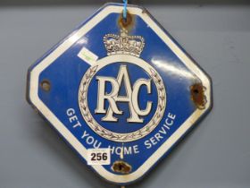 A BLUE AND WHITE ENAMEL SIGN FOR THE RAC TOGETHER WITH AN IRON ROUNDEL VAST WITH THE MICHELIN MAN,