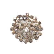 AN ANTIQUE OLD CUT DIAMOND WREATH BROOCH. UNHALLMARKED, THE FRONT ASSESSED AS SILVER WITH A LOW
