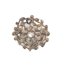 AN ANTIQUE OLD CUT DIAMOND WREATH BROOCH. UNHALLMARKED, THE FRONT ASSESSED AS SILVER WITH A LOW