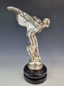 A HEAVY SILVERED SPIRIT OF ECSTASY STYLE DESK FIGURE.