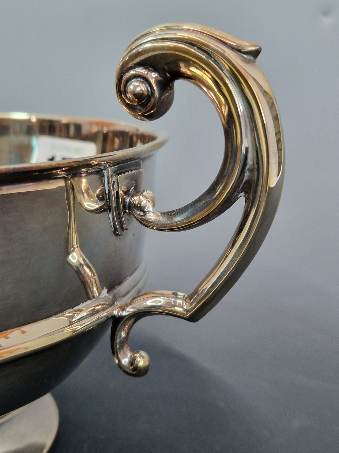 A SILVER TWO HANDLED BOWL BY CARRINGTONS, BIRMINGHAM 1912, INCISED WITH A 1974 PRESENTATION - Image 3 of 4