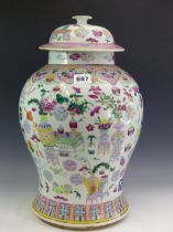 A 19th C. CHINESE BALUSTER JAR AND COVER PAINTED IN FAMILLE ROSE ENAMELS WITH PRECIOUS OBJECTS