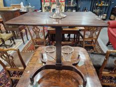 A 19th C. MAHOGANY TABLE, THE HEIGHT OF THE RECTANGULAR TOP ADJUSTABLE ON THE SQUARE COLUMN