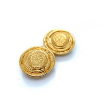 A PAIR OF YSL VINTAGE ROUND TEXTURED DISC CLIP ON EARRINGS, SIGNED TO REVERSE YSL, MADE IN FRANCE.