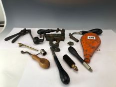 TWO BRONZE CARTRIDGE EXTRACTORS, VARIOUS ANTIQUE RELOADING TOOL, A LARGE NIPPLE KEY, CLEANING RODS