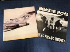 BEASTIE BOYS 2 LP'S, CHECK YOUR HEAD 1ST PRESSING. EUROPEAN GRAND ROYAL EST 2171 AND LICENSED TO ILL