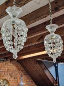 A PAIR OF GLASS CEILING LIGHTS, THE WAVY TOPS SUPPORTING BEAD BASKETS