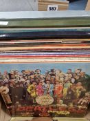 A SMALL COLLECTION OF LPS INCLUDING THE BEATLES - SGT PEPPER STEREO REISSUE, HELP!, WITH THE