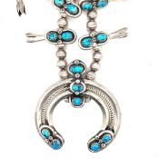 A CLASSIC VINTAGE, ASSESSED SILVER AND TURQUOISE SQUASH BLOSSOM NECKLACE SIGNED I. YAZZIE FOR YAZZIE