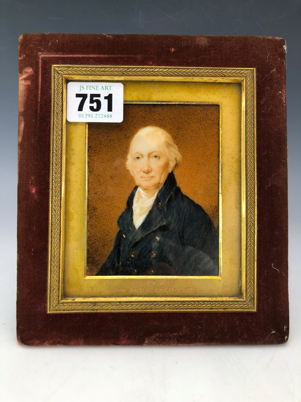 A PORTRAIT MINIATURE OF ANDREW WOOD (1742-1821) AGAINST A BROWN GROUND AND WITHIN AN EASEL BACKED
