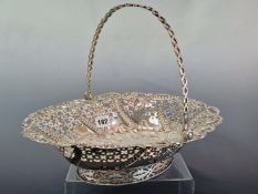 A GEORGE III SILVER BASKET, LONDON 1812, THE PIERCED OVAL SIDES WITH REPOUSSE WHEAT EARS AND